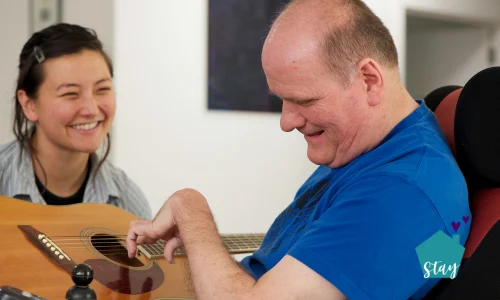 man with developmental disability and care caretaker